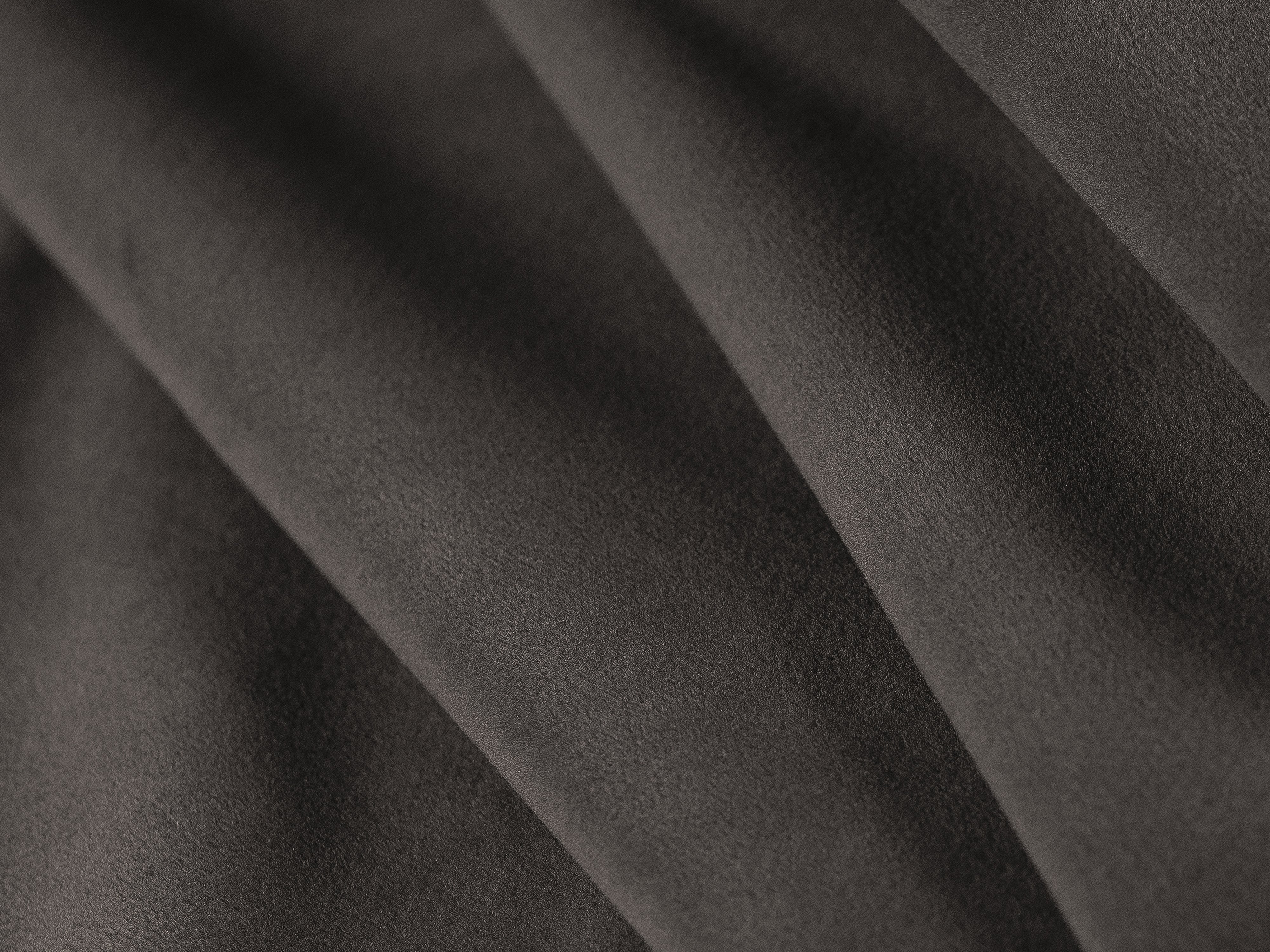 Velvet dark gray fabric with glossy