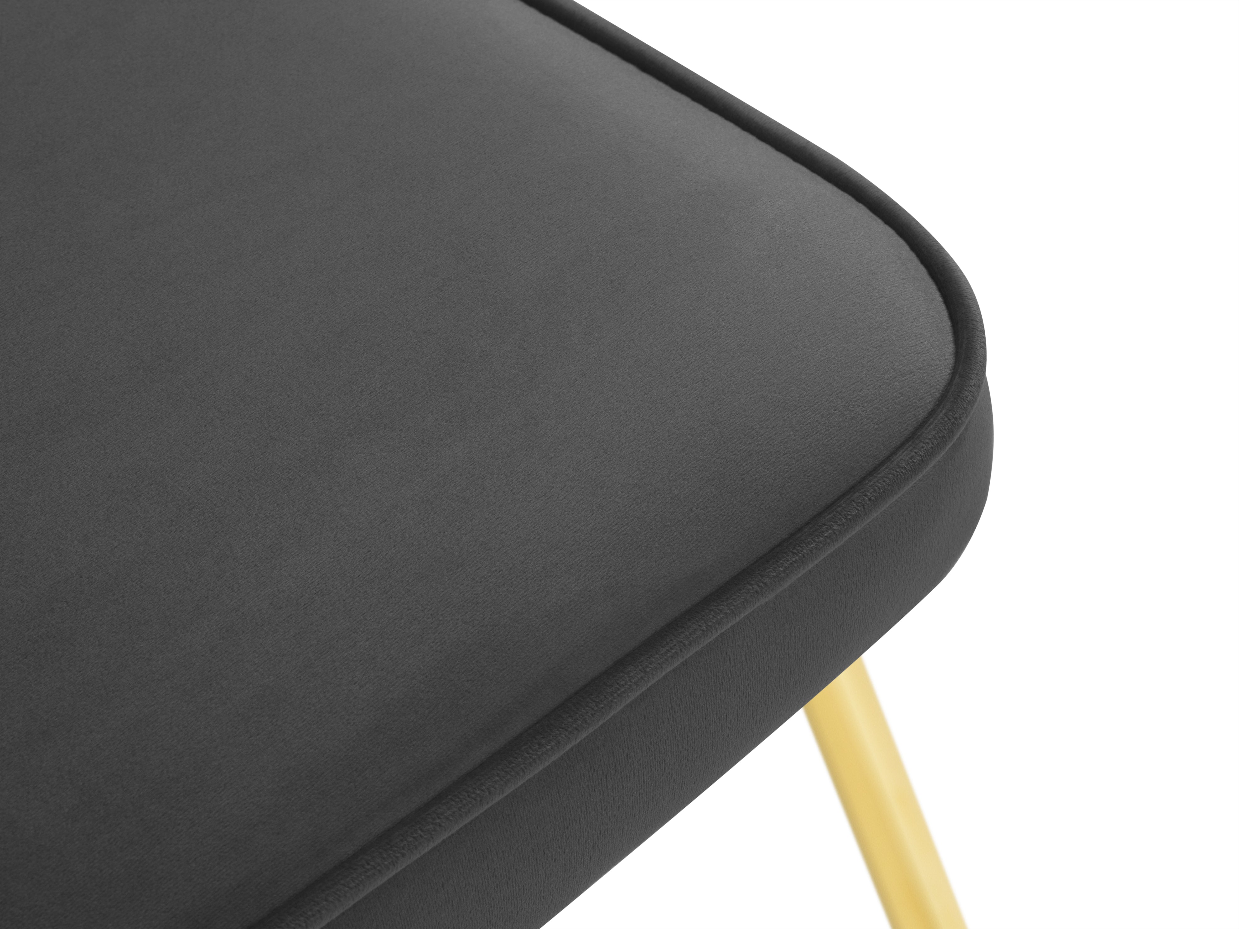 A dark gray chair with a golden base