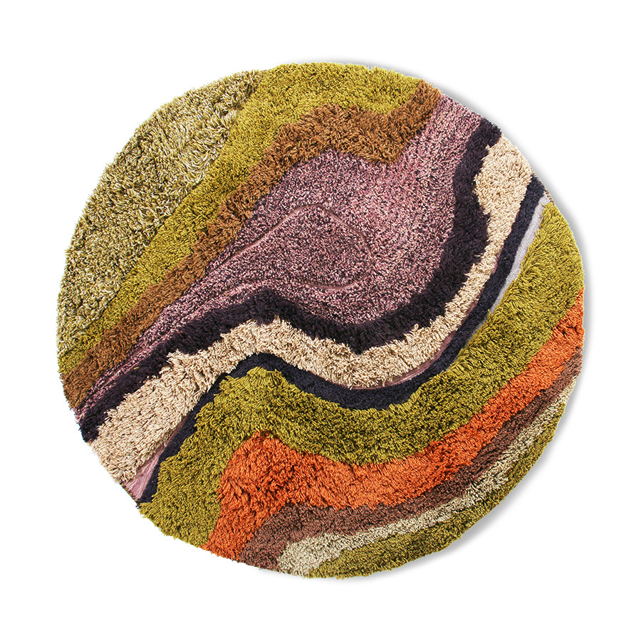 A round rug with irregular shapes in many colors is an expression of an artistic soul. This one was made of wool, which boasts long, thick and soft fibers, creating a warm and comfortable atmosphere. Manual performance gives it authenticity. This will help emphasize the originality and uniqueness of the living room in a classic climate. The bedroom with Midcentura Modern decor will become more friendly and more vivid, and getting up in it will be a pleasure.